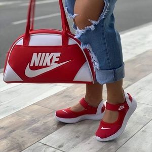 red nike shoes with matching purse